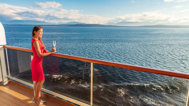 Woman stands on the edge of cruise