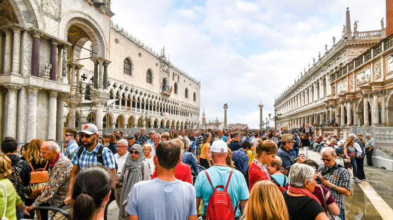 Tourist crowds filling the streets of Venice, Italy