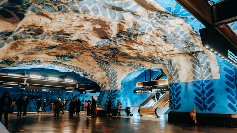 Artwork illuminated on the walls of Stockholm Central metro station