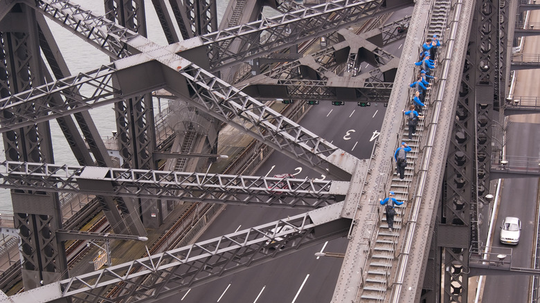 Participants hiking up Sydney Harbour Bridge with BridgeClimb in Australia