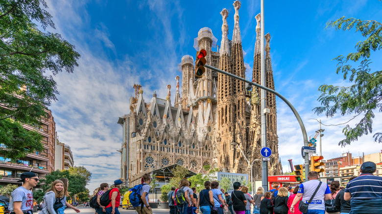 Barcelona's Sagrada Familia with tourists in the foreground