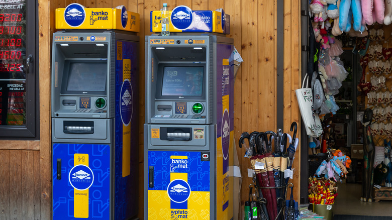 Euronet ATMs beside a store in Europe