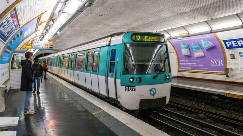 A paris metro train to St Denis pulls into the station