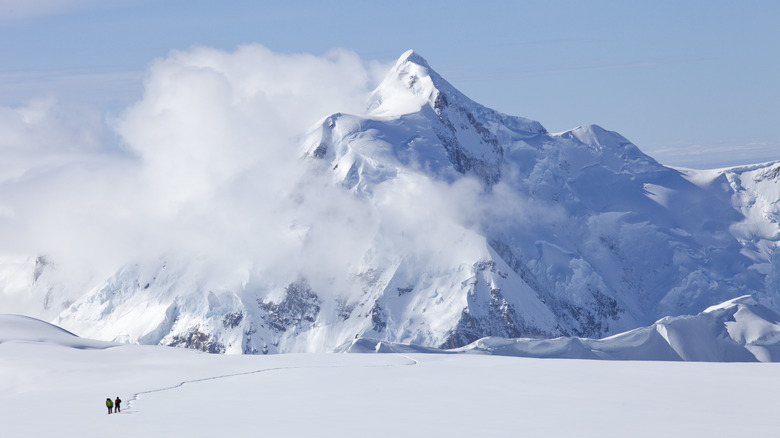 two hikers snow denali peak