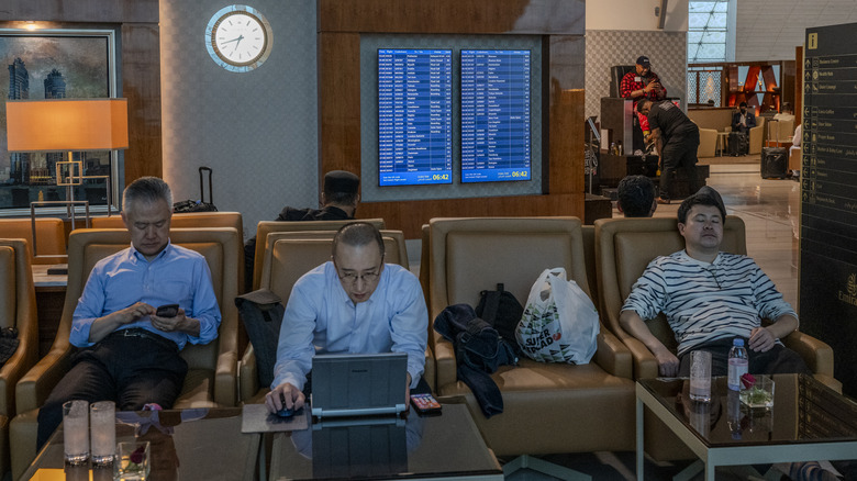 passengers in airport lounge