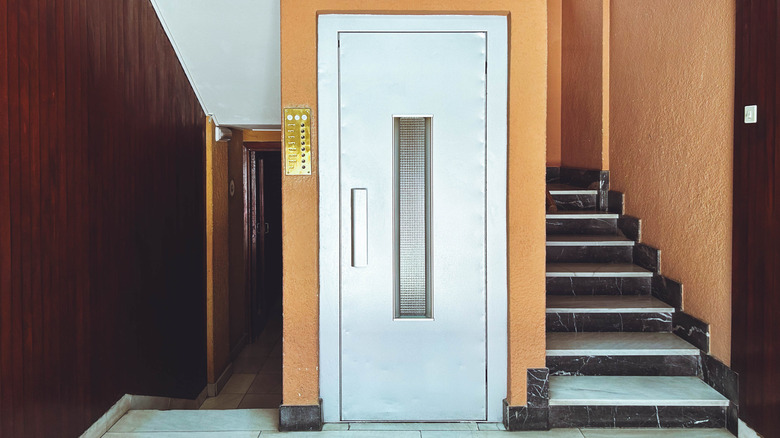 A small elevator in a European apartment building