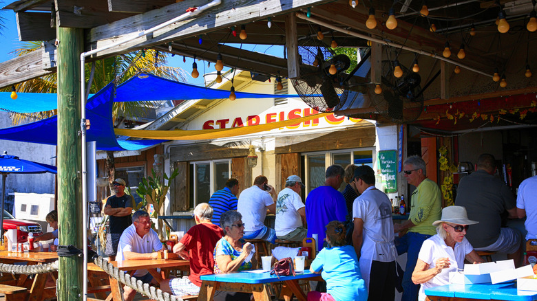 People enjoying lunch at the Star Fish restaurant in Cortez, Florida