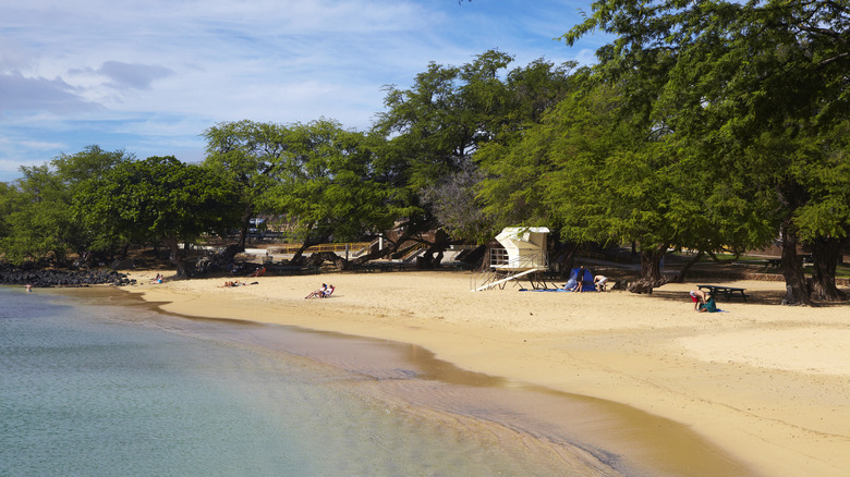 People lounging on Hapuna Beach