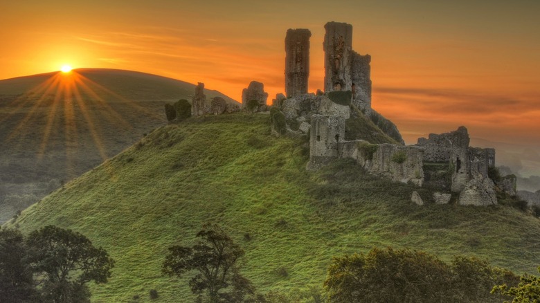 Corfe Castle in Dorset, England, at sunrise