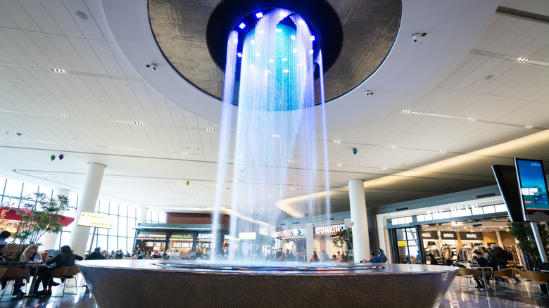 Spacey illuminated water feature in LaGuardia Airport