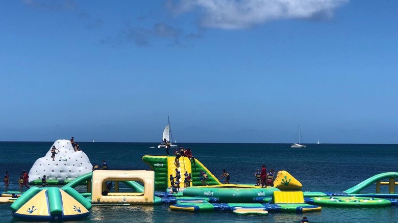 Floating inflatable obstacle courses at Splash Island in St. Lucia