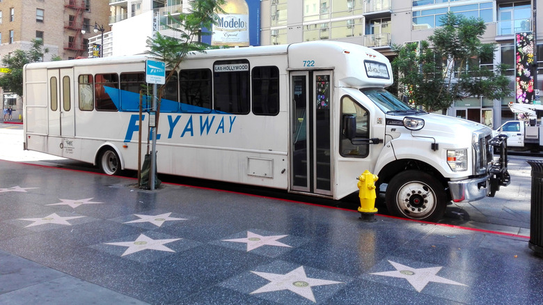 LAX airport shuttle bus parked on street