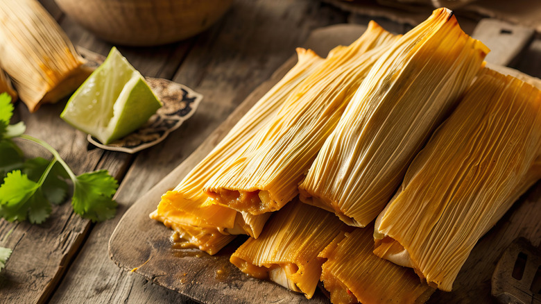 Delicious tamales stacked on a table