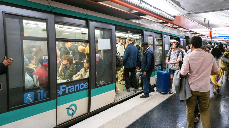 People inside the Paris Metro