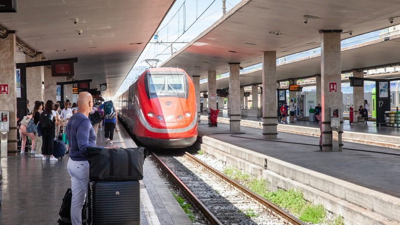 Italian Trenitalia train arriving at a station