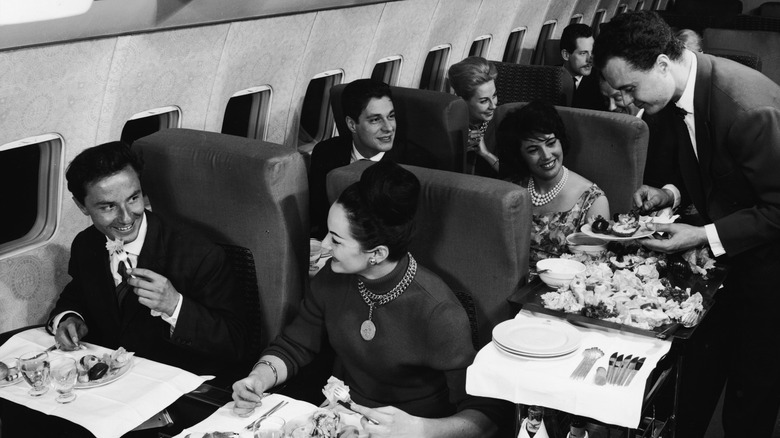 1950s air passengers in black and white