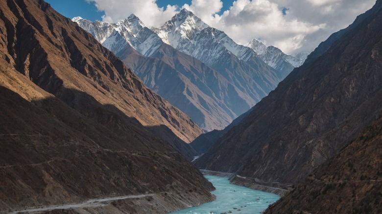 The Yarlung Tsangpo River cuts through the Yarlung Tsangpo Grand Canyon, the largest and deepest canyon in the world