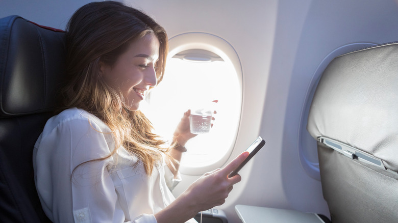 Person sitting in a plane seat