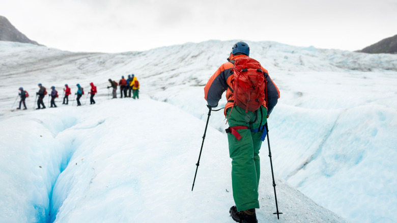 People hiking Exit Glacier at Kenai Fjords National Park in Alaska