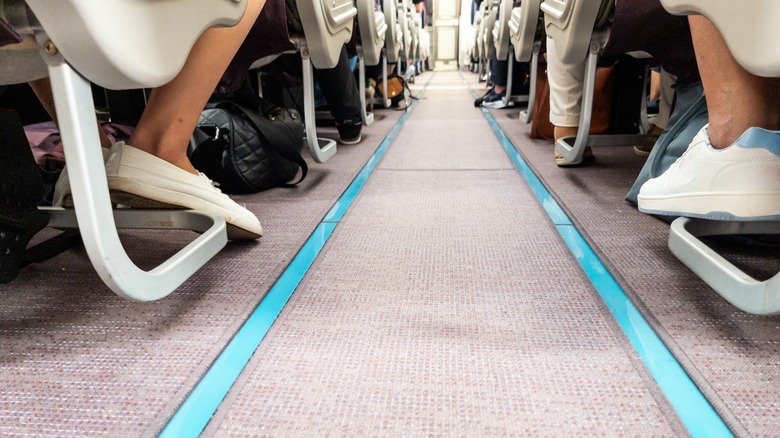 Emergency lighting on the floor of an aircraft