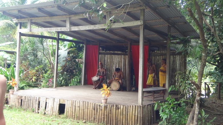 Kalinago members perform in traditional garb