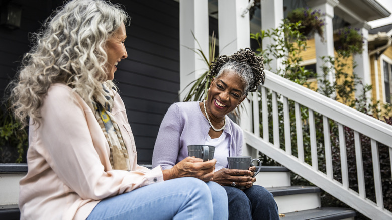 Two women talking over coffee