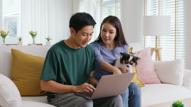 Couple making a vacation booking