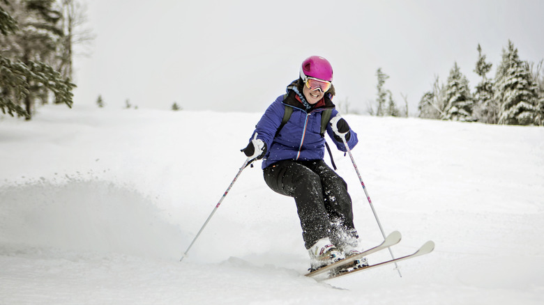 A woman skies in Sugarloaf, Maine