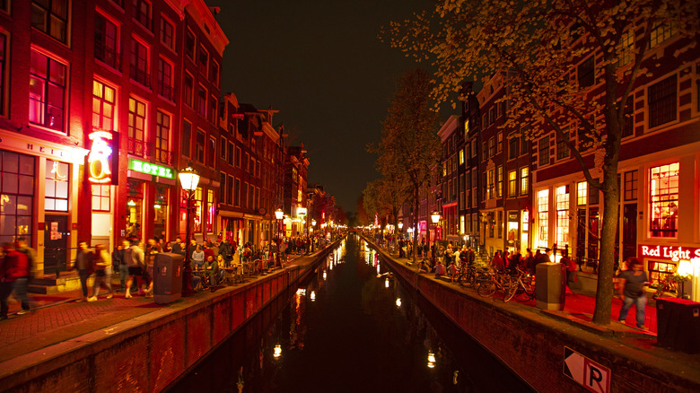 Canal at night lit by red light