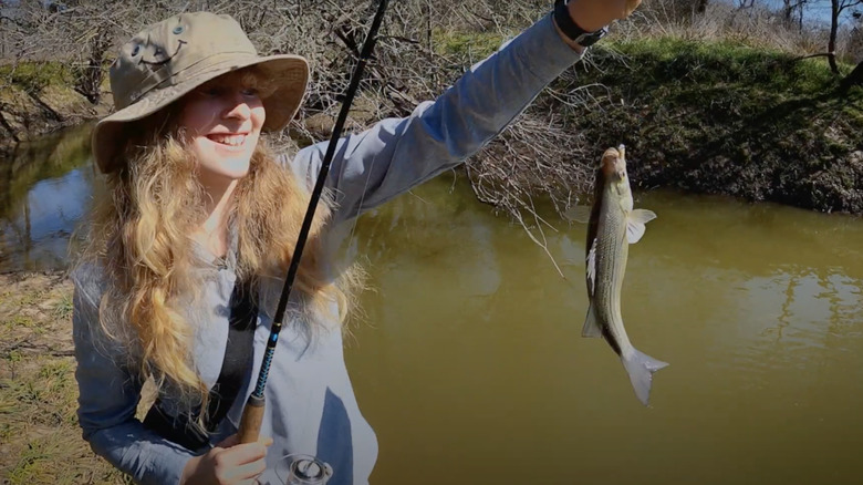 Young girl with a fish she caught at Lake Somerville