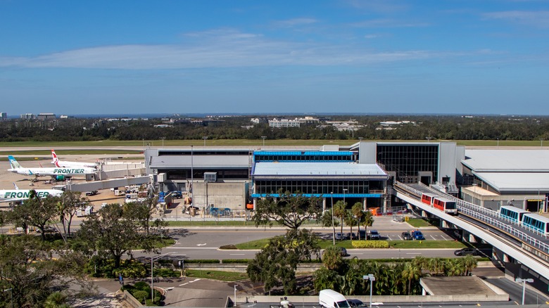 Tampa International Airport exterior with aircraft and main terminal