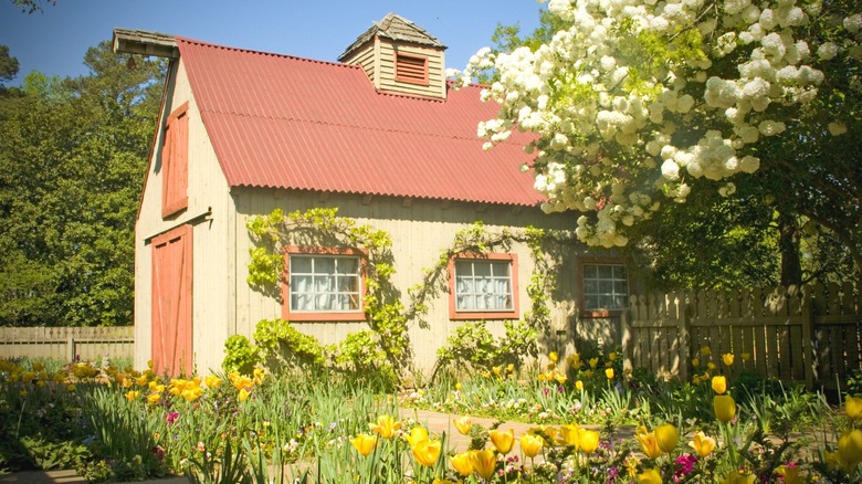 Flowers and a barn at Georgia's Callaway Gardens