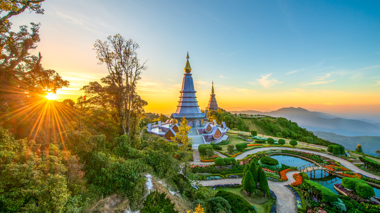 Temple in Doi Inthanon overlooking a lush mountainous landscape