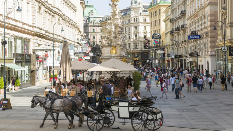 People walking through Central Square in Vienna