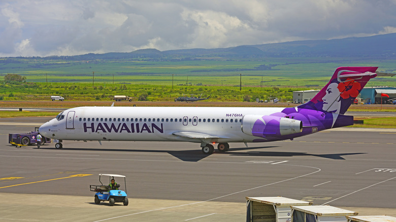 Hawaiian Air plane taxiing at airport