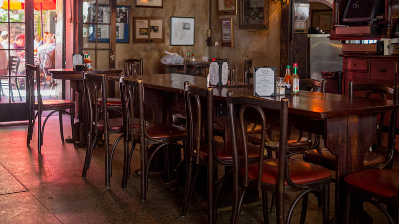 tables and chairs inside the Napoleon House in New Orleans