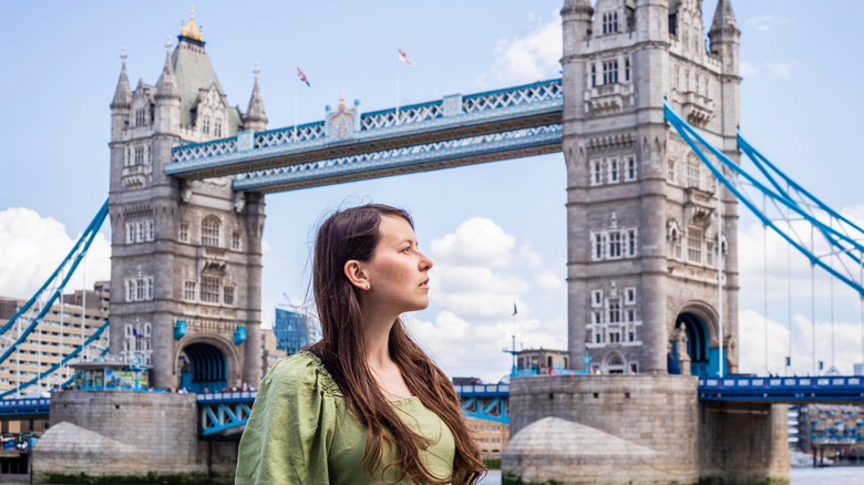 Pregnant woman by London's Tower Bridge