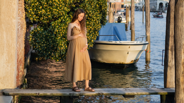 Pregnant in Venice, by the canal