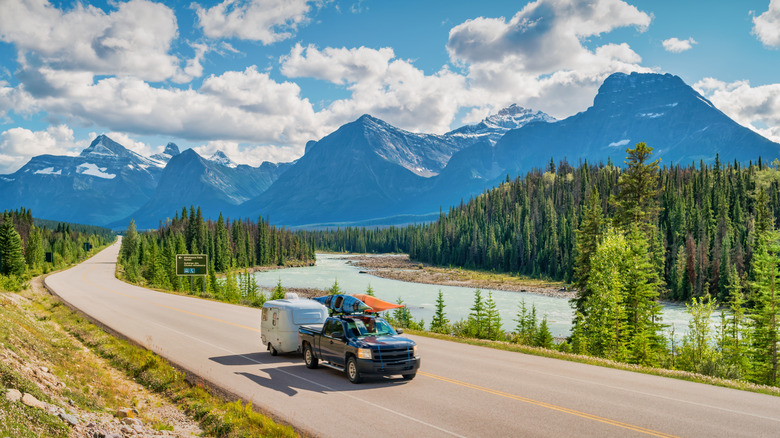 Car driving on Icefields Parkway in Jasper National Park