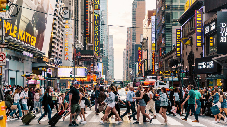 Pedestrians crossing a street in New York City