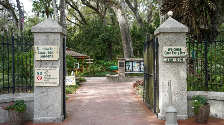 Open entrance gates to Dunlawton Sugar Mill Gardens