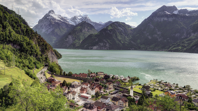 The village of Sisikon with mountains and Lake Lucerne in the background