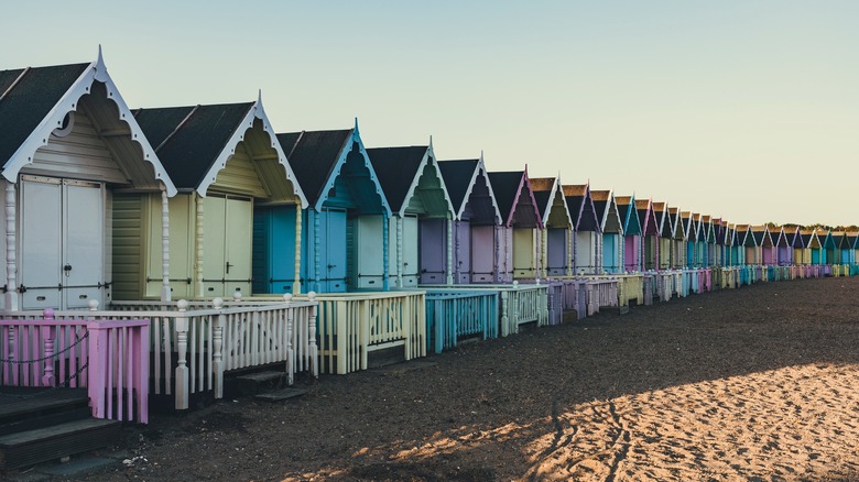 Colorful huts on the sand in Osea