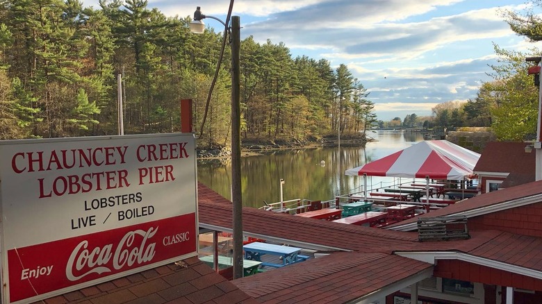 View of Chauncey Creek Lobster Pier's patio and creekside view