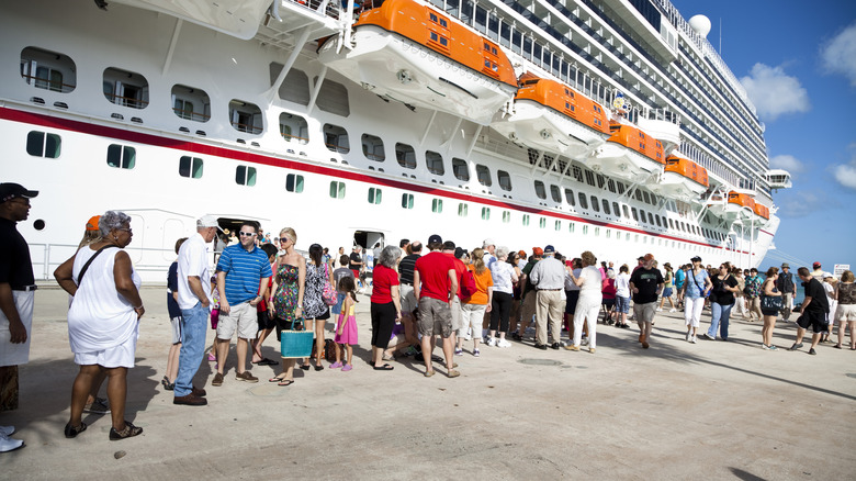 Passengers boarding a cruise ship