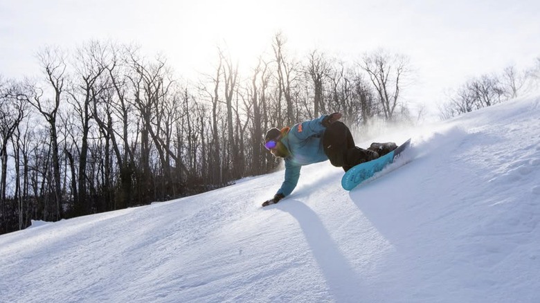 A boarder rips down the hill at Catamount Mountain Resort