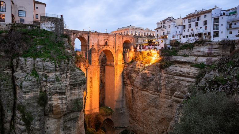 Ancient bridge spanning deep gorge in Ronda, Spain