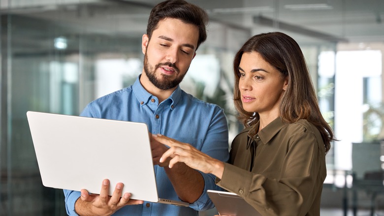 Couple looking at a computer