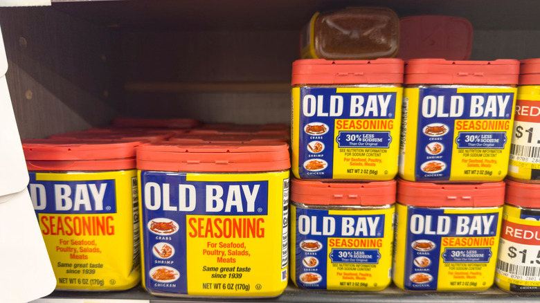 A shelf lined with Old Bay