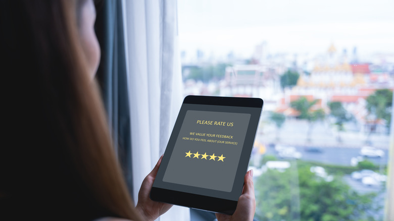 Woman reviewing a hotel